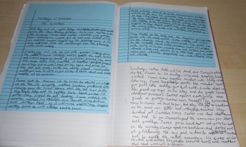 Exercise book with writing in